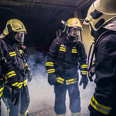 Group of firefighters in the fire department checking their gas